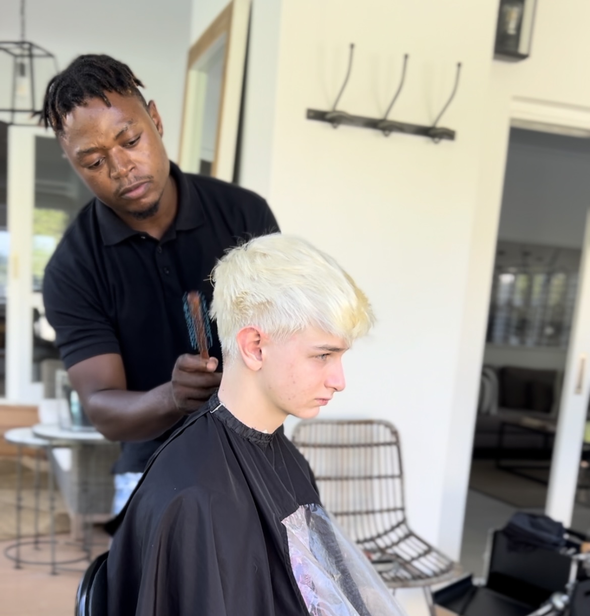 Moses applying blonde hair colour